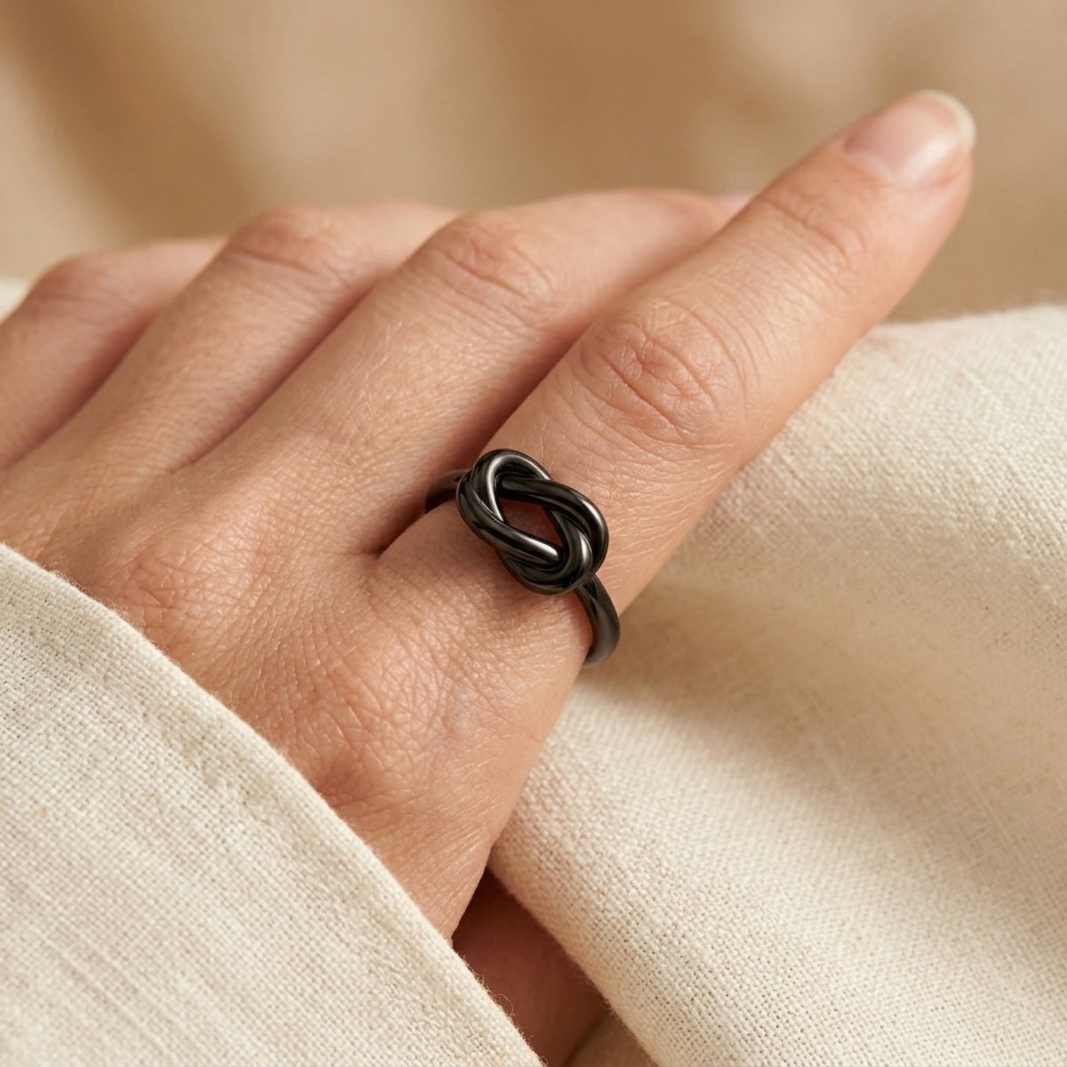 Black PVD Love Knot Heart Friendship Ring worn