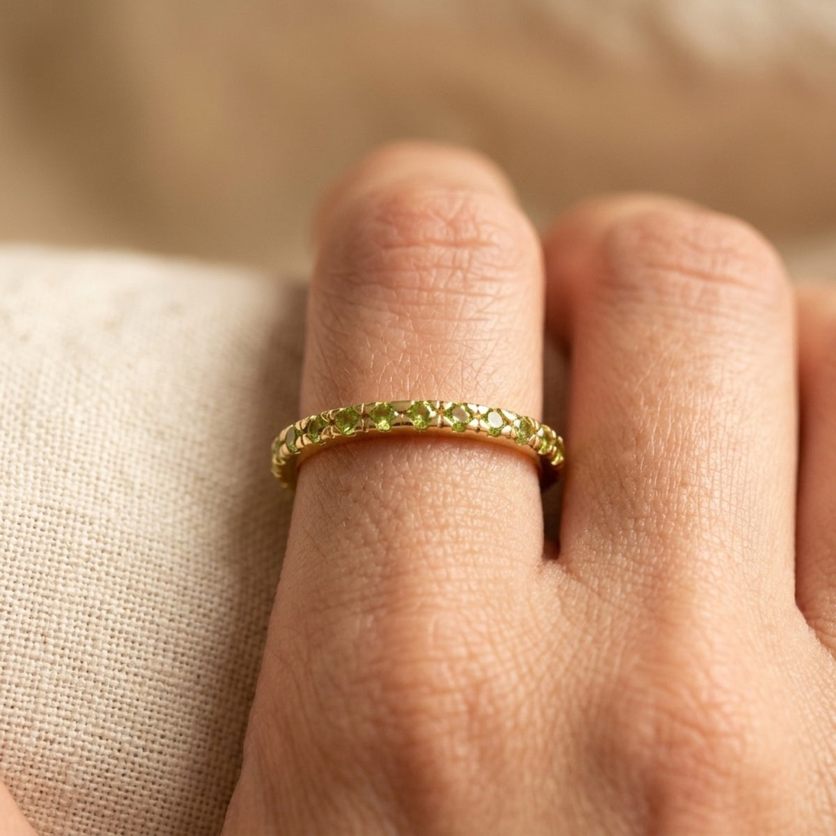 Peridot CZ Gold Tone Eternity Stacking Ring worn