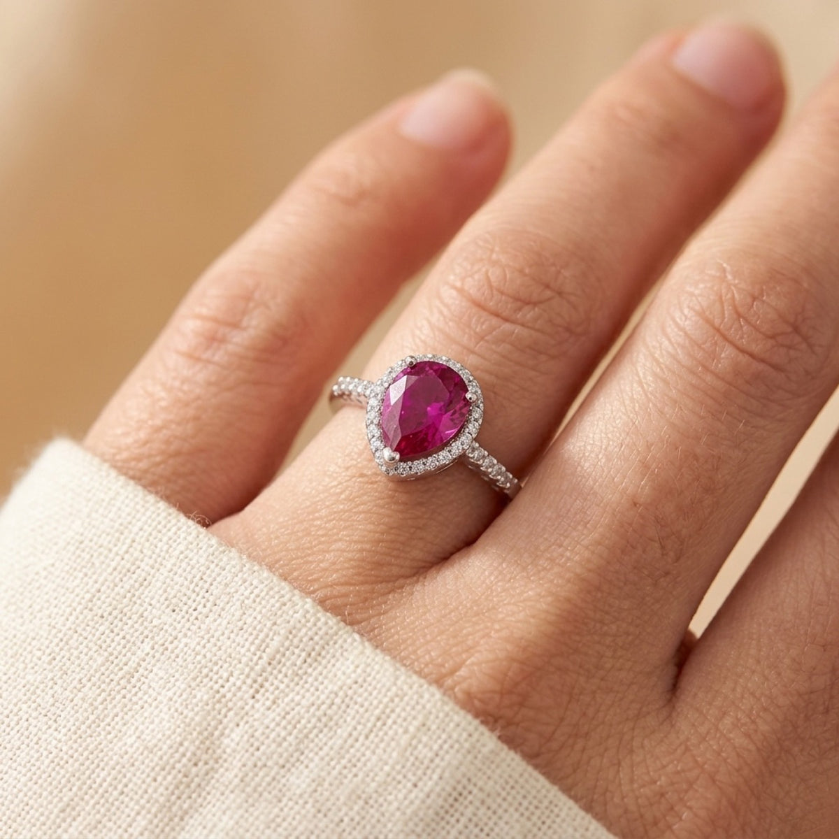 Ruby CZ Promise Teardrop Solitaire Halo Ring worn