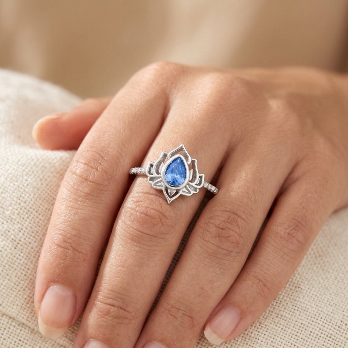 Blue Topaz Lotus Ring worn