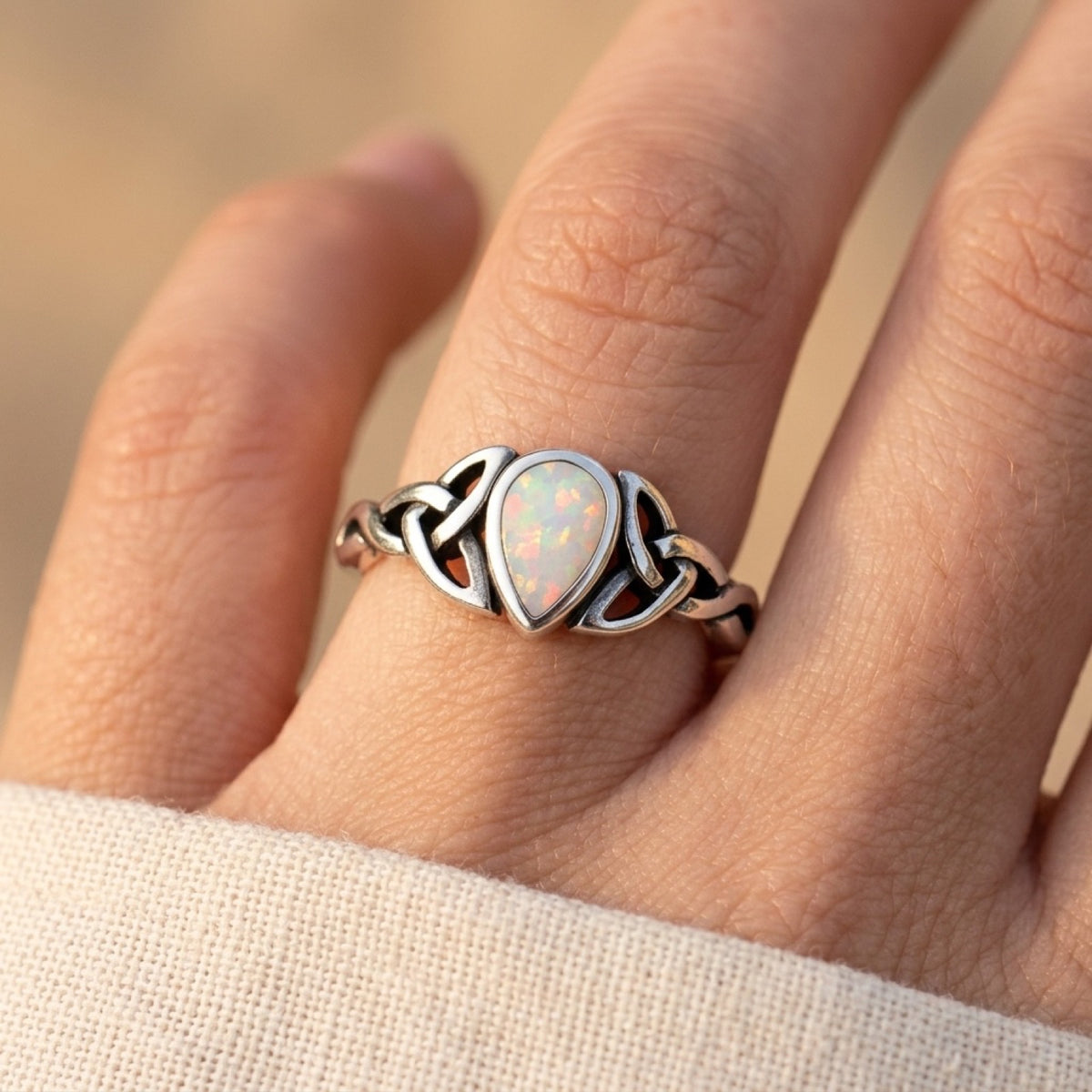 White Lab Opal Celtic Ring worn