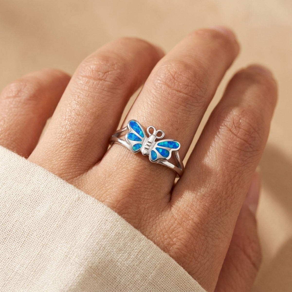 Blue Lab Opal Butterfly Animal Ring worn