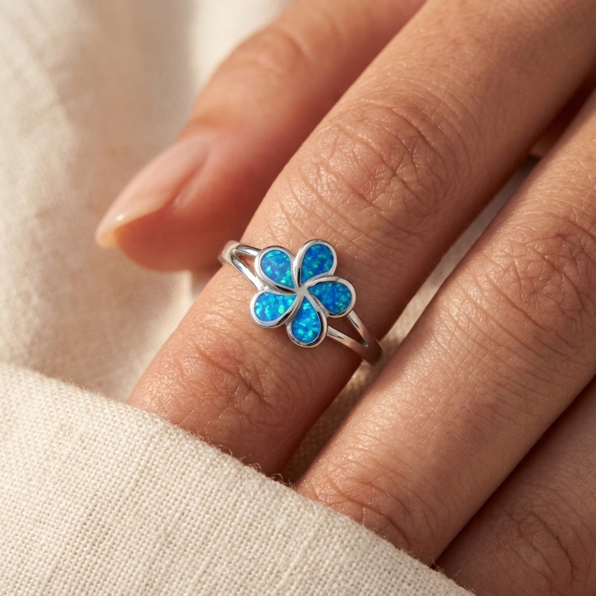 Blue Lab Opal Plumeria Flower Ring worn