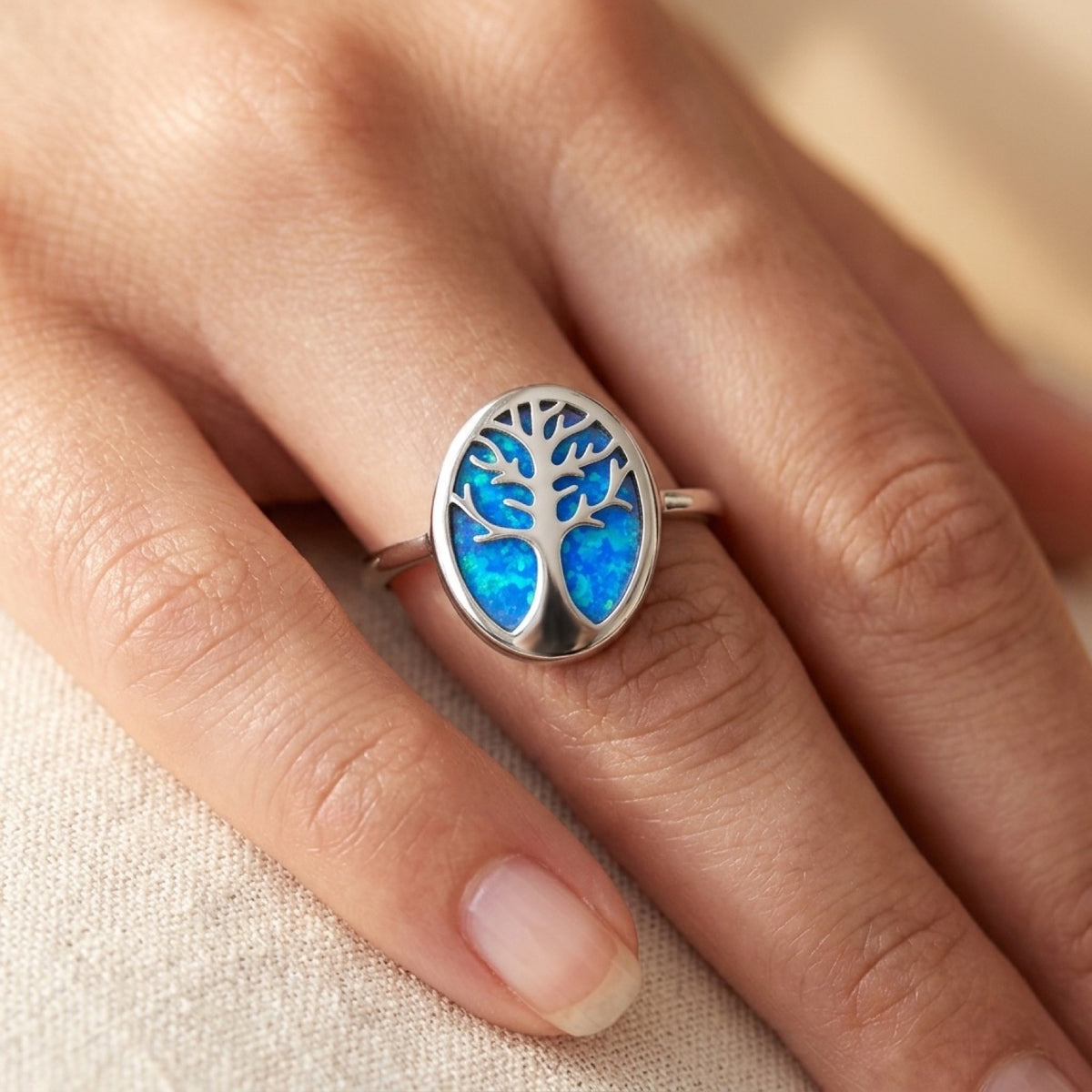 Blue Lab Opal Oval Tree of Life Ring worn