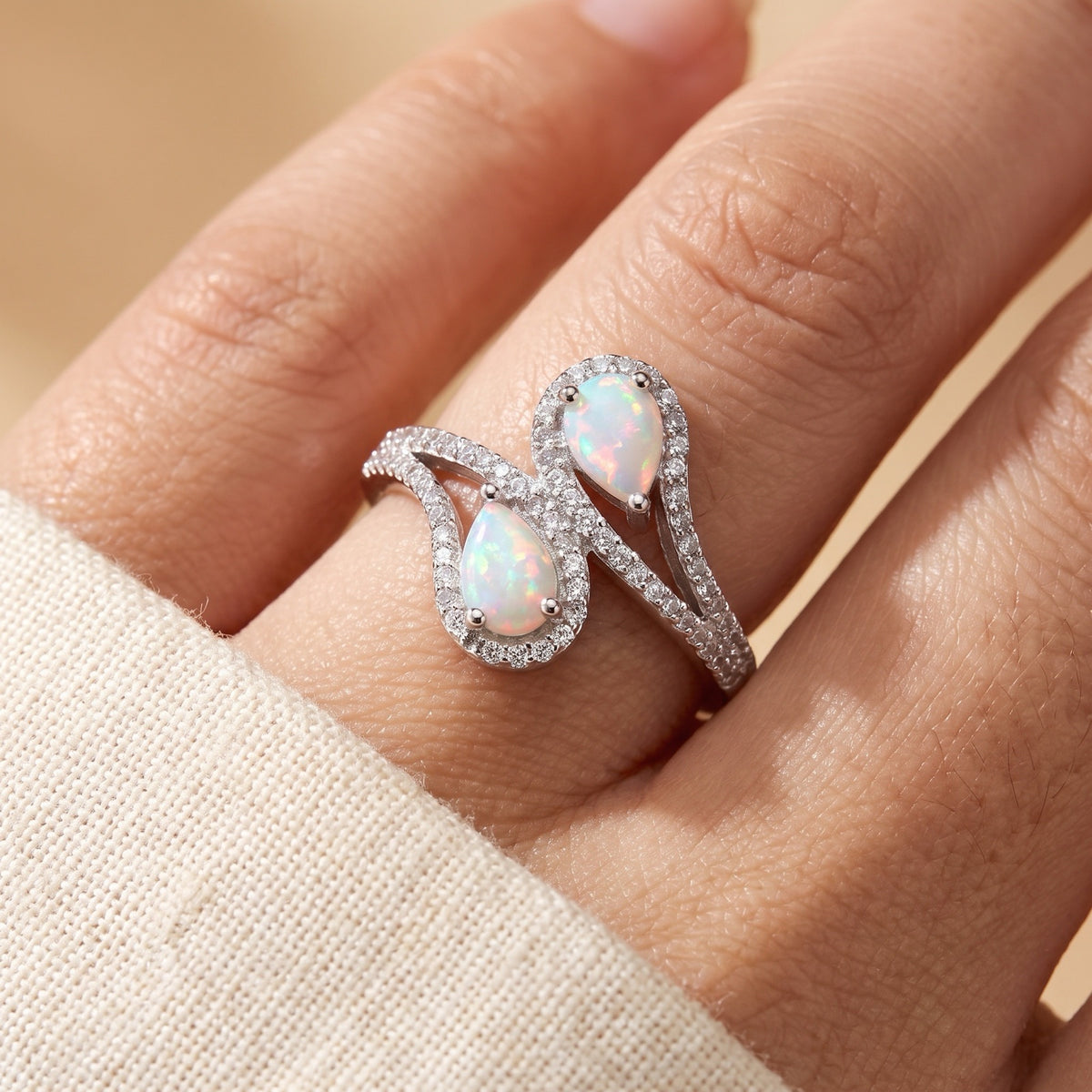 Clear CZ Teardrop White Lab Opal Halo Ring worn