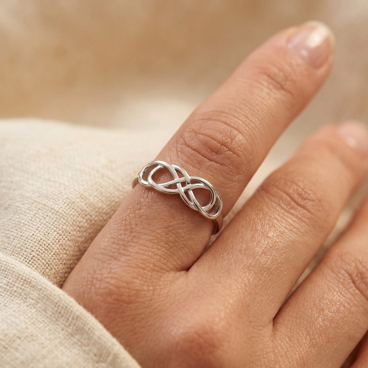 Infinity Knot Criss Cross Braid Promise Ring worn