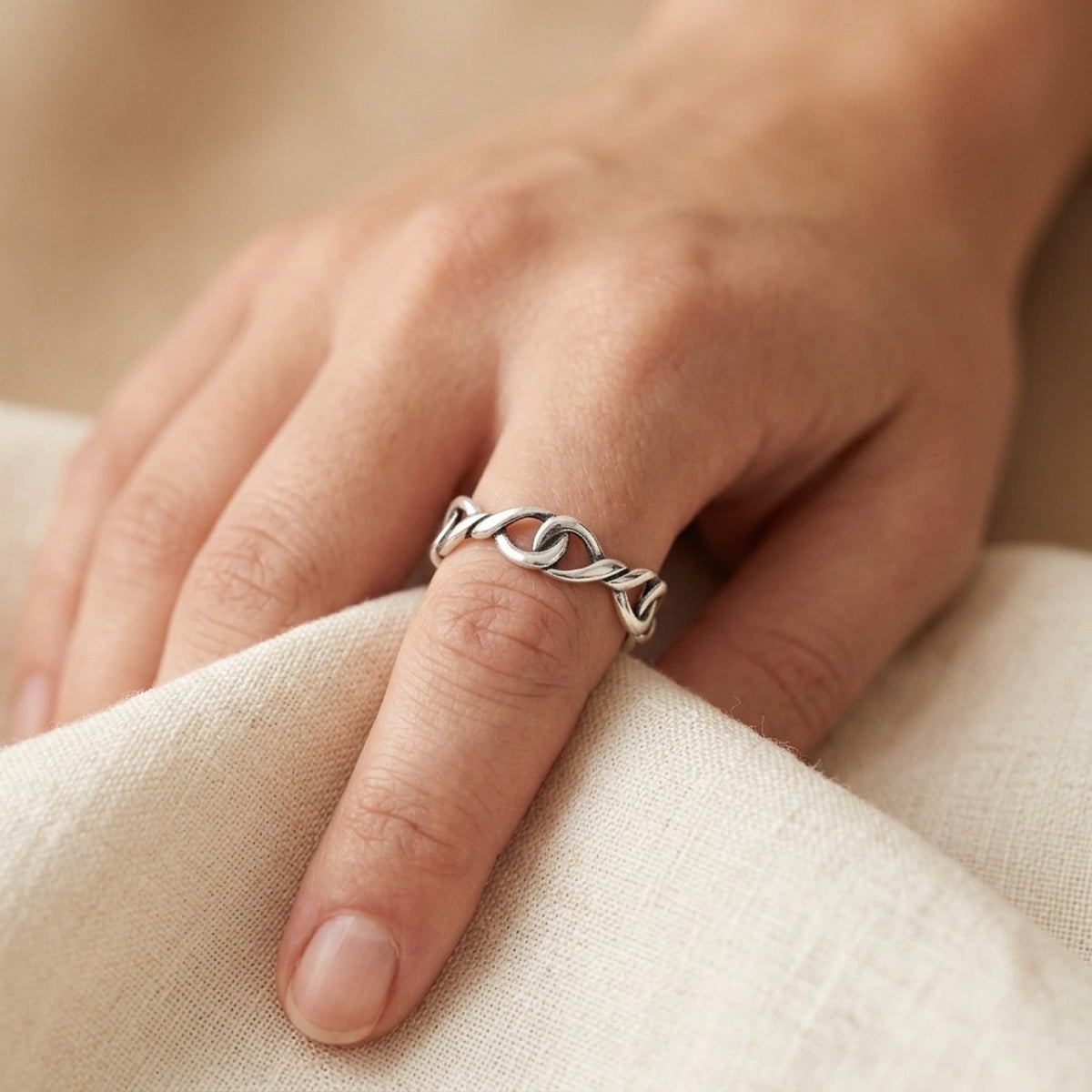 Infinity Twist Knot Love Ring worn