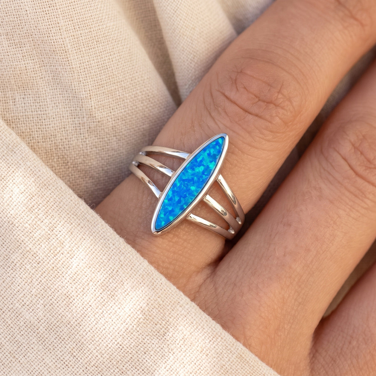 Marquise Blue Lab Opal Ring worn