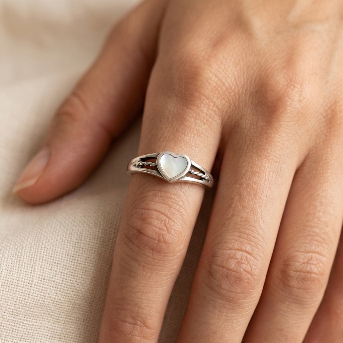 Mother of Pearl Oxidized Rope Heart Purity Ring worn