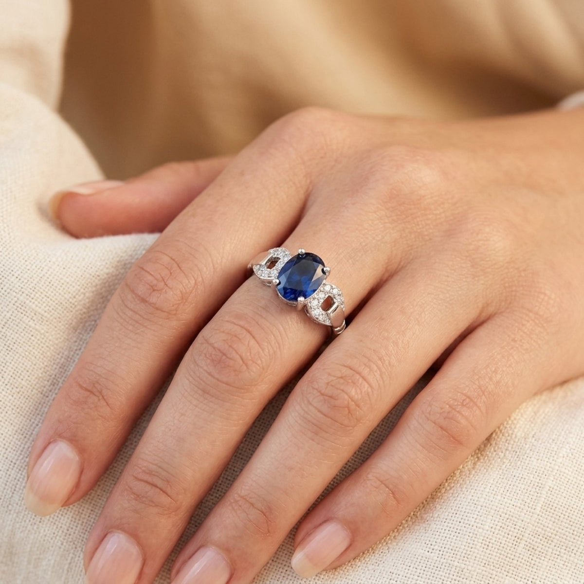 Oval Blue Sapphire CZ Solitaire Wedding Ring worn