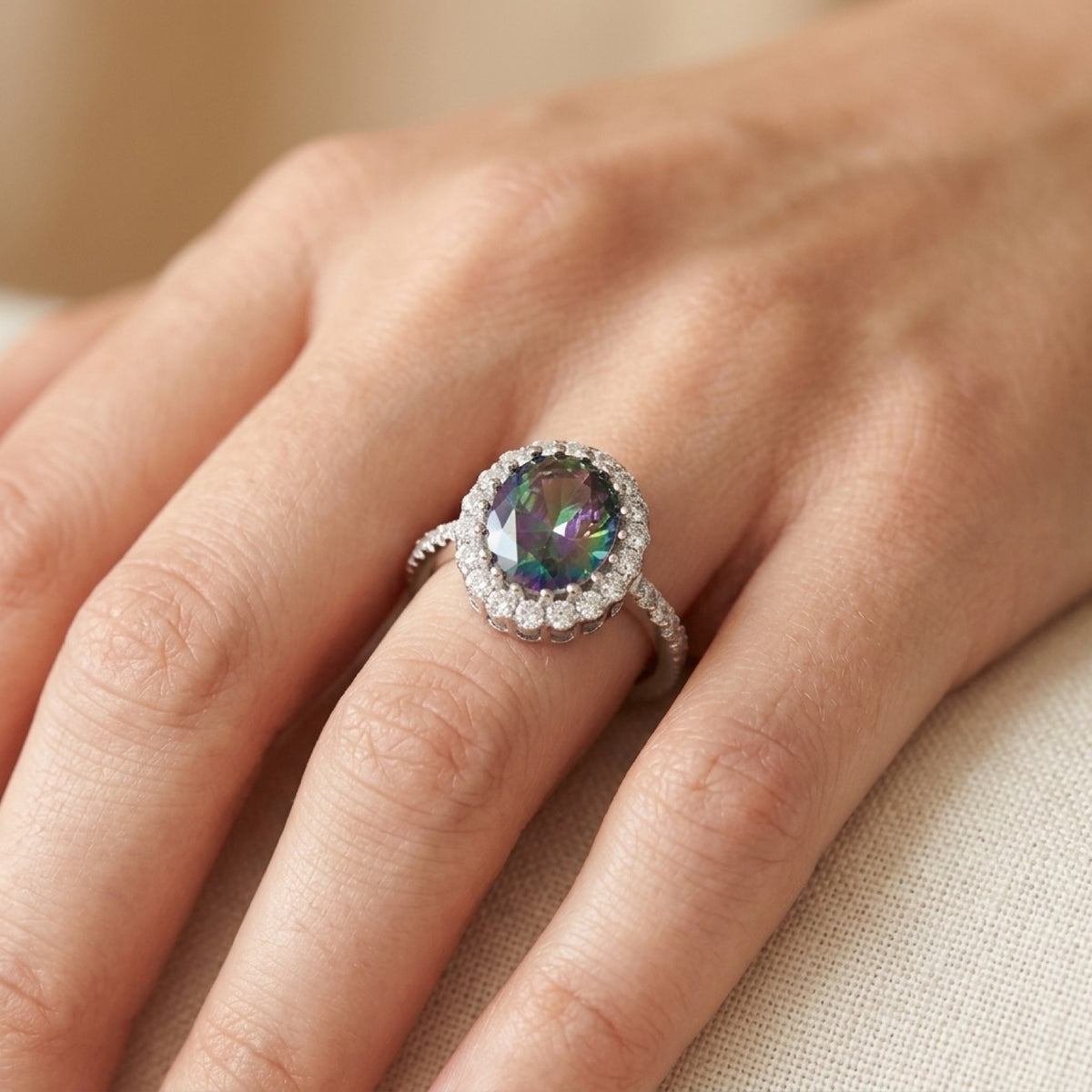 Rainbow Topaz Studded Halo Oval Ring worn