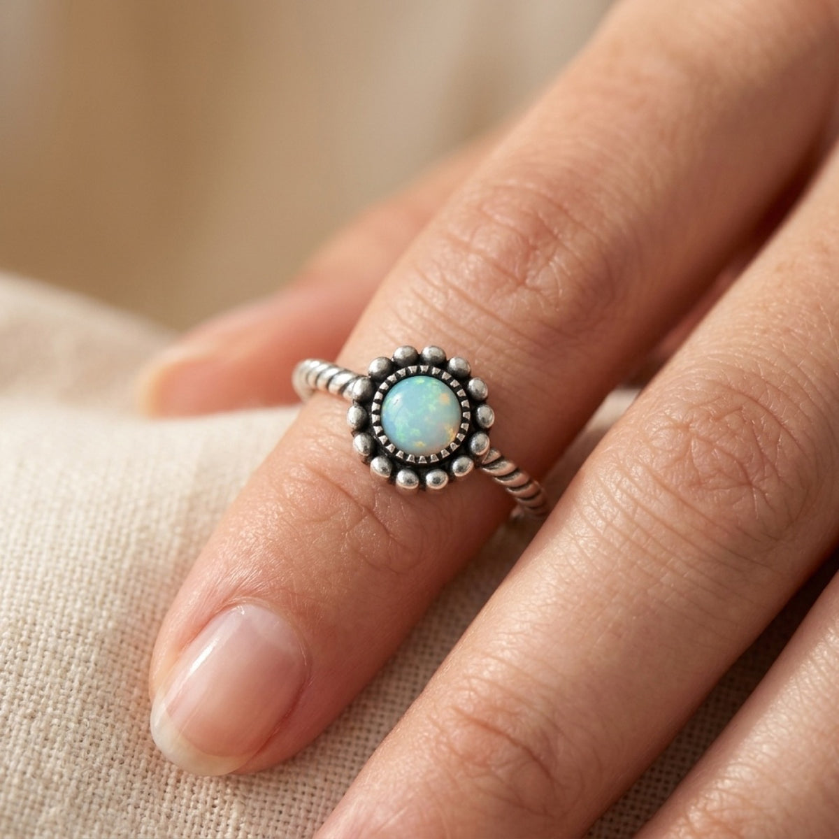 Rope Sun White Lab Opal Ring worn