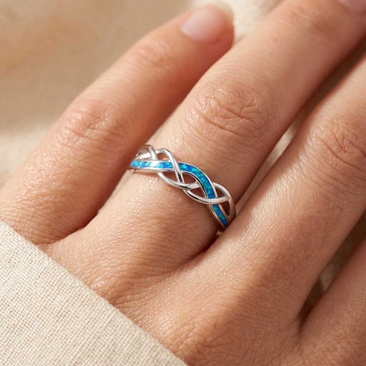 Rope Wave Blue Lab Opal Ring worn