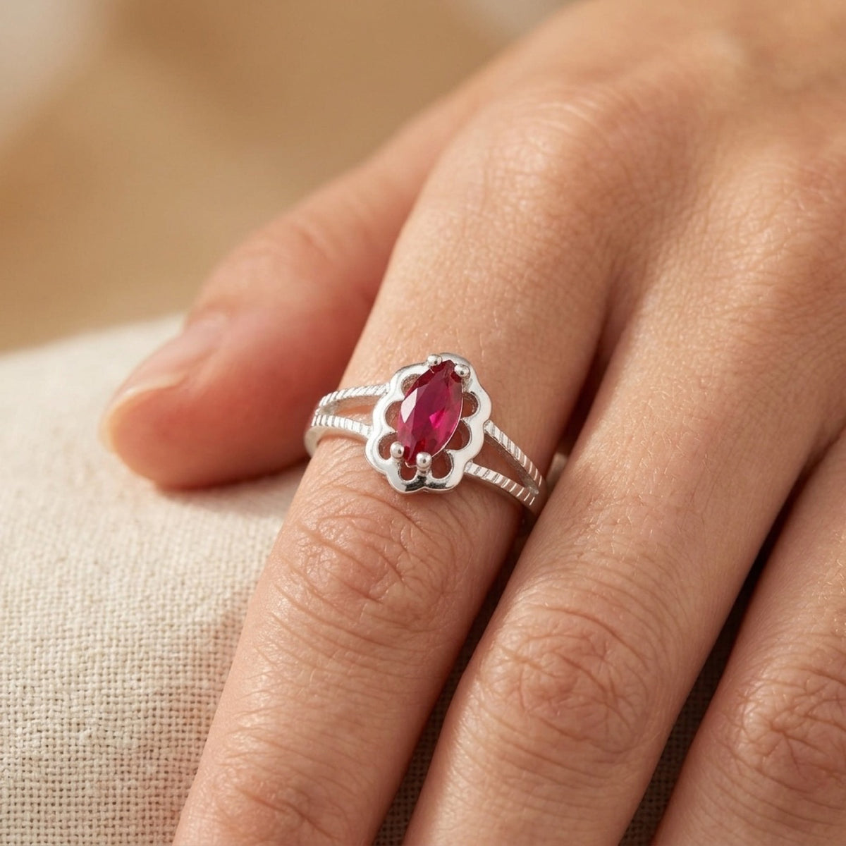 Ruby CZ Flower Halo Marquise Baby Ring worn