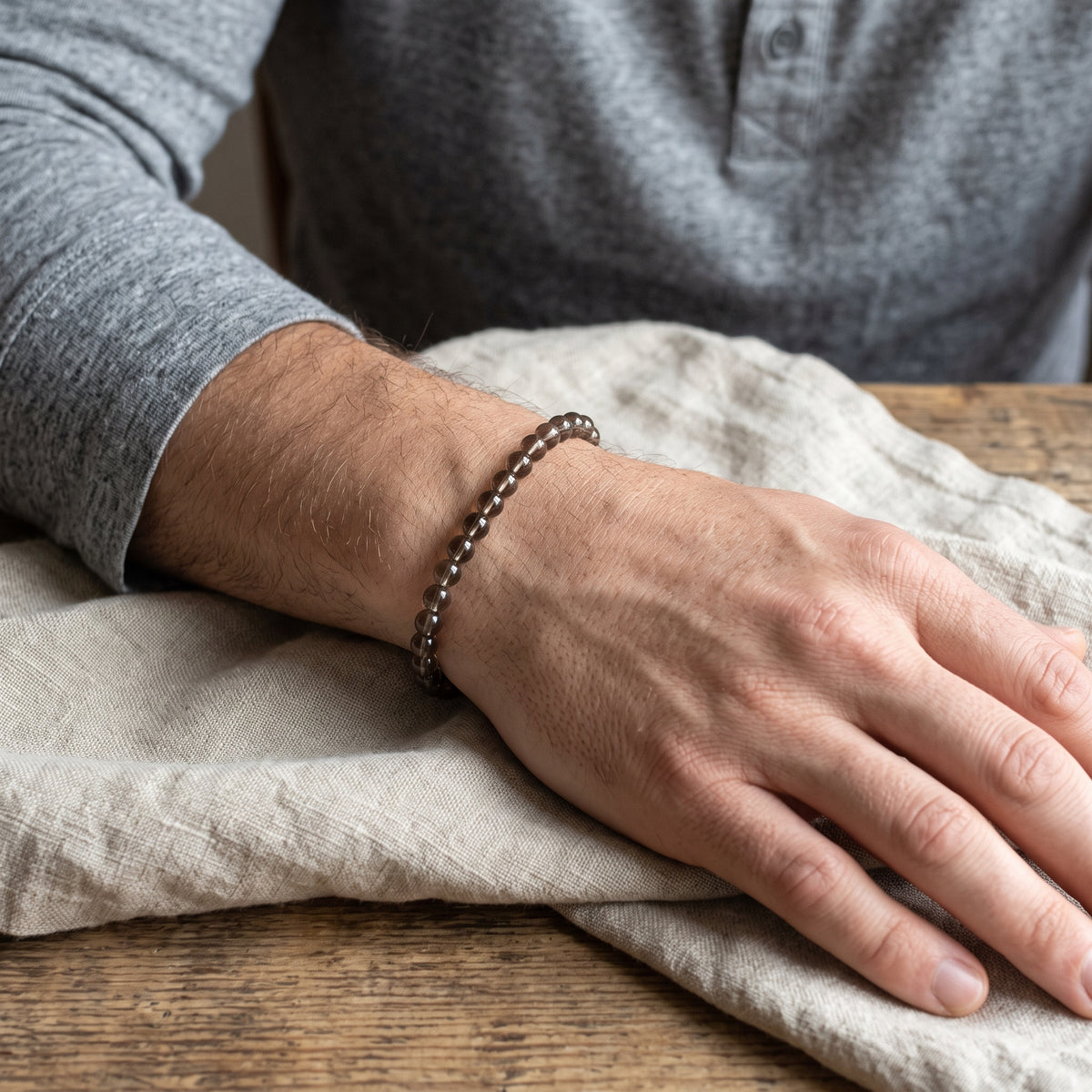 Smoky Quartz 4mm Stretch Bracelet on wrist