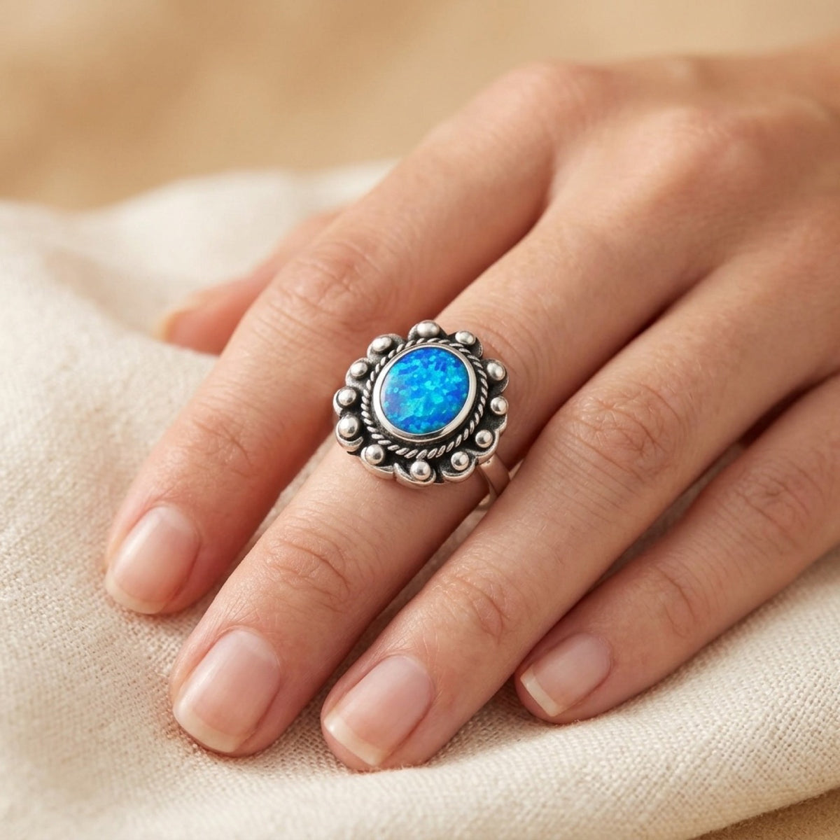 Blue Lab Opal Bali Ring worn