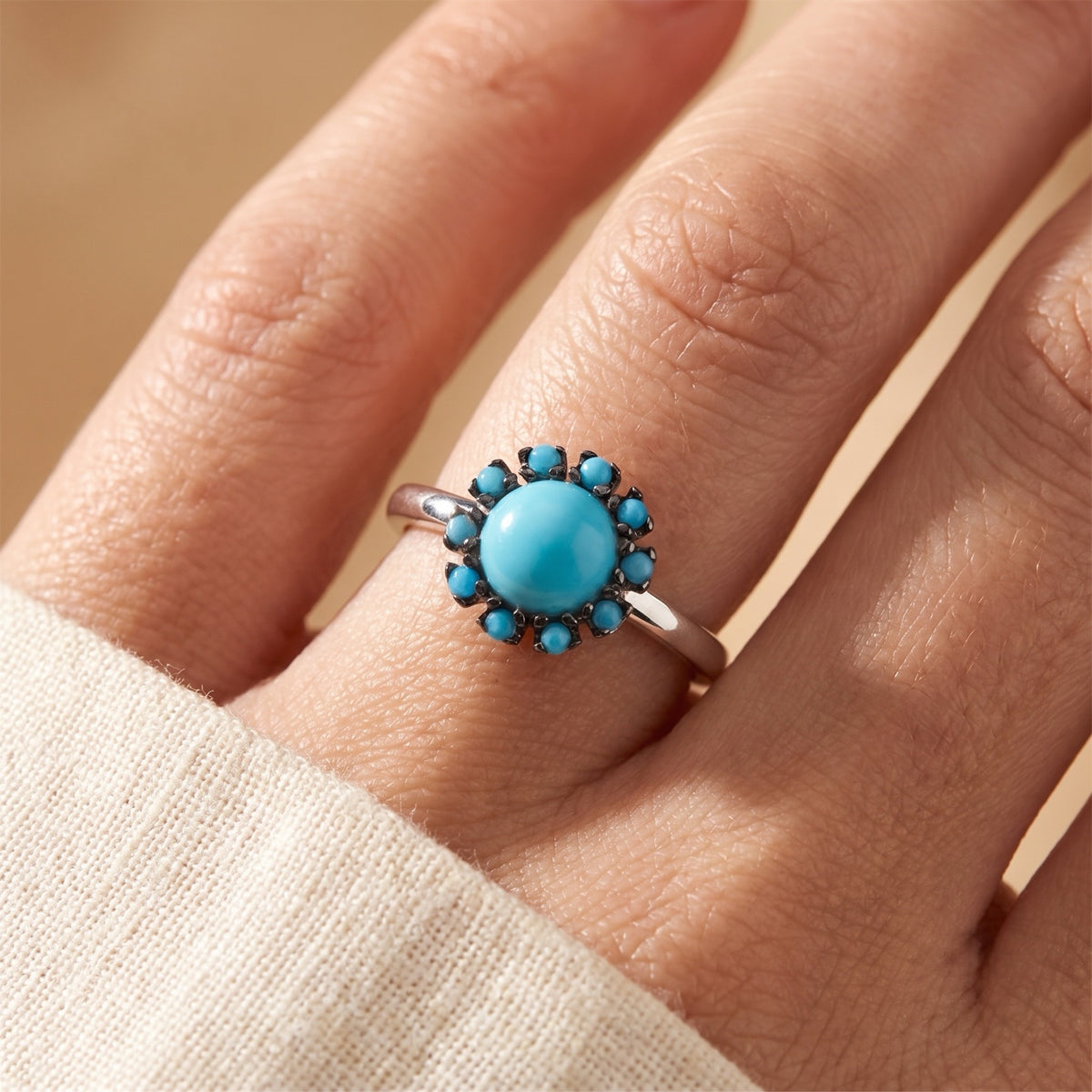 Turquoise Blue Flower Halo Ring worn