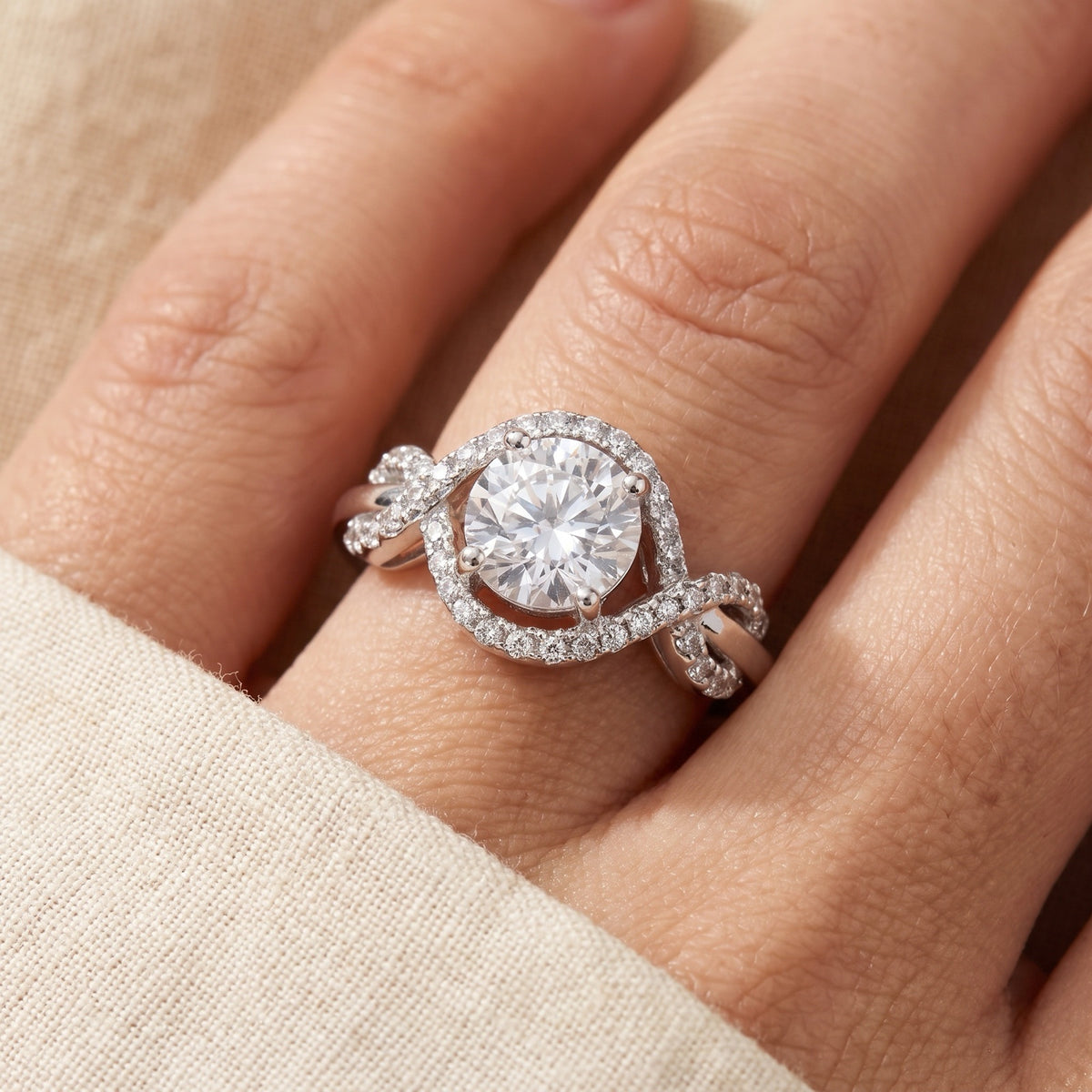 White CZ Solitaire Infinity Halo Engagement Ring worn