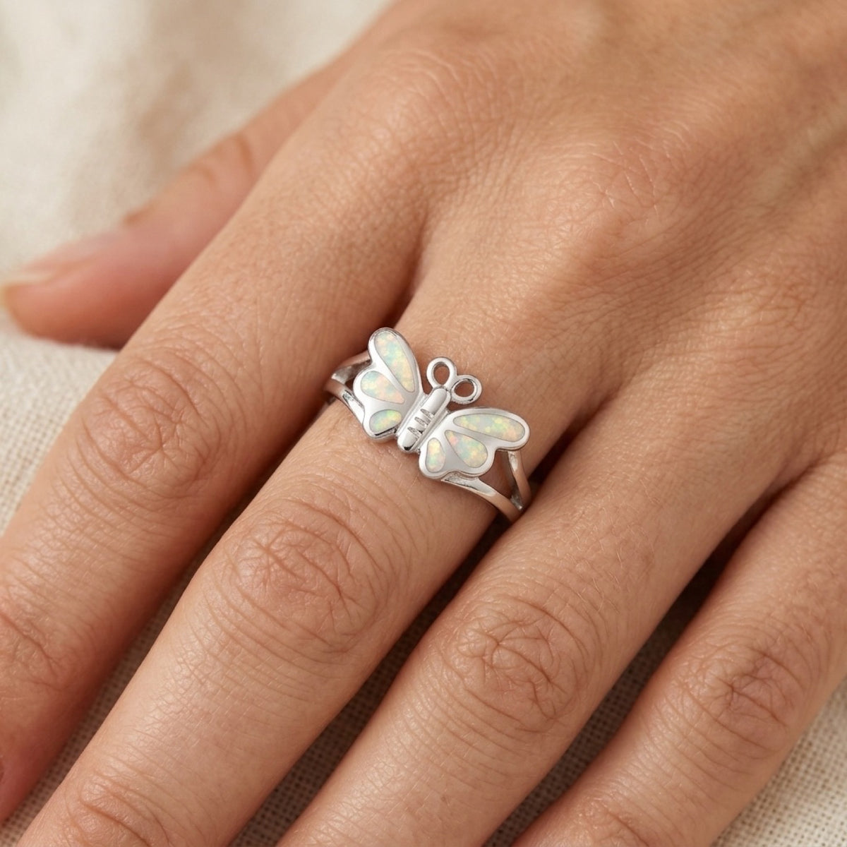 White Lab Opal Butterfly Mosaic Ring worn