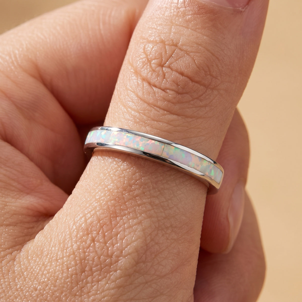 White Lab Opal Thumb Wedding Ring worn